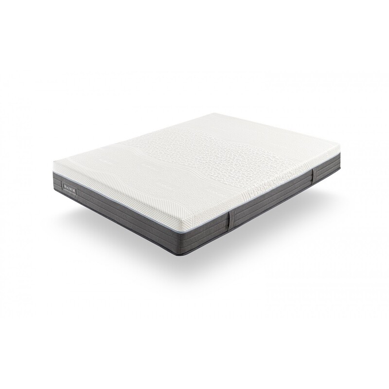 Vista detallada del colchón Magnum sobre una base de cama, mostrando su diseño acolchado y superficie ergonómica, ideal para ofrecer un descanso óptimo y soporte lumbar.