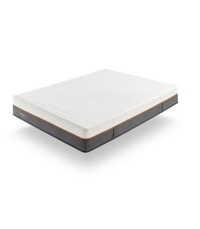 Imagen del colchón Unique en ambiente moderno, destacando su acabado premium y superficie acolchada que proporciona confort personalizado y soporte ergonómico para un descanso superior."