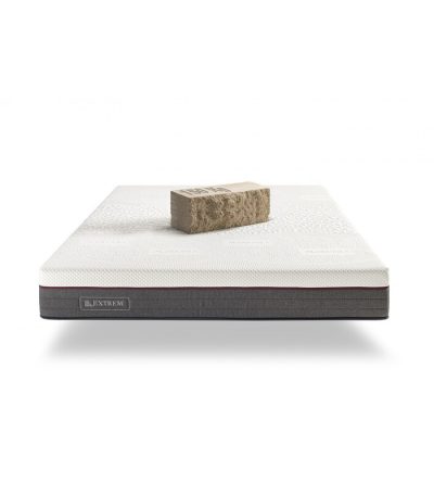 Colchón Extreme XXL de gran tamaño, diseñado para ofrecer firmeza y soporte extra. Imagen del colchón sobre base robusta, en ambiente moderno y elegante.